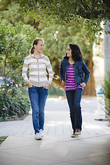 Image showing Tween Girls Walking On Sidewalk