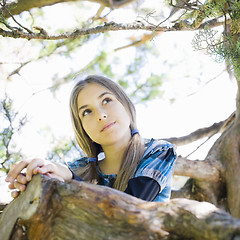 Image showing Portrait of Tween Girl in Tree