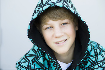 Image showing Boy in Hood Smiling To Camera