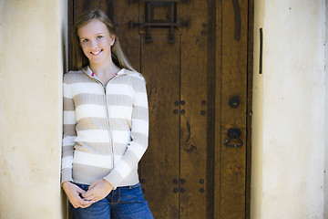 Image showing Tween Girl Standing In Doorway