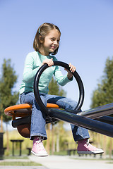 Image showing Girl on Seesaw