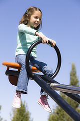 Image showing Girl on Seesaw