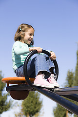 Image showing Girl on Seesaw