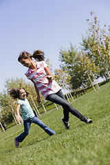 Image showing Two Sisters in Park