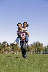 Image showing Two Sisters in Park