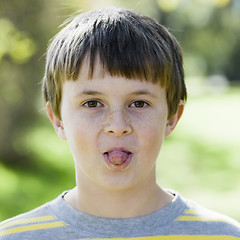 Image showing Boy Sticking Tongue Out