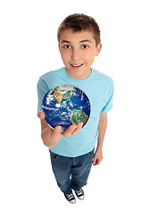 Image showing Boy holding planet earth