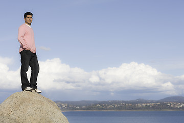 Image showing Portrait of Man Standing on Rock