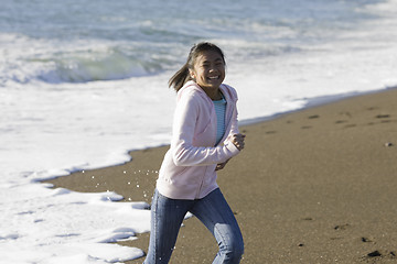 Image showing Teenage Asian Girl at Beach