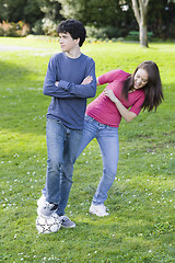 Image showing Teen Boy and Girl with Soccer ball