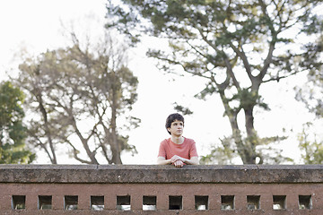 Image showing Teen Boy Outdoors Looking Away From Camera