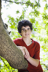 Image showing Teenage Boy Standing in Woods