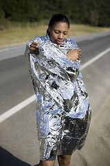 Image showing Runner Wrapped in Space Blanket  