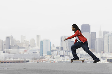 Image showing Teen Boy on Skateboard