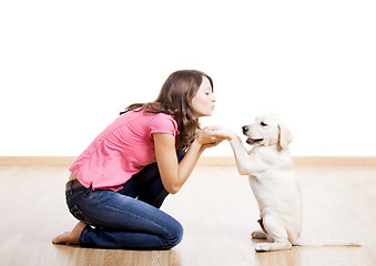 Image showing Playing with a puppy