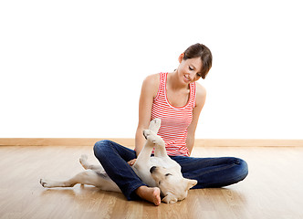 Image showing Playing with a puppy