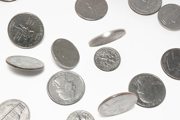 Image showing Falling US coins on isolated background