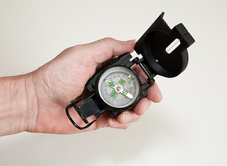 Image showing Hand Holding Compass