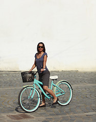 Image showing Woman With A Bicycle In A City