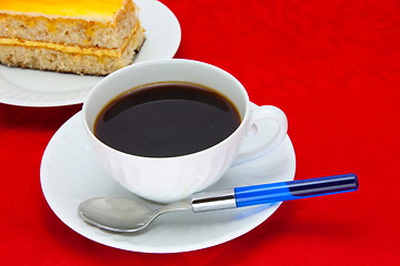 Image showing Coffee cup over red background