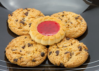 Image showing cookies on plate isolated on white backgrounds