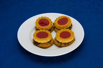 Image showing cookies on a Plate on a blue background