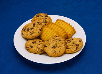 Image showing cookies on a Plate on a blue background