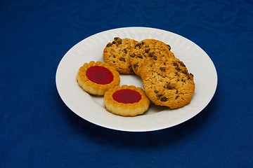 Image showing cookies on a Plate on a blue background