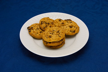 Image showing cookies on a Plate on a blue background