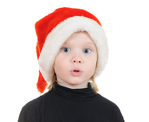 Image showing The child in a hat santa claus