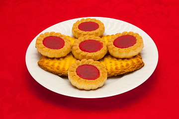 Image showing plate of cookies on red background