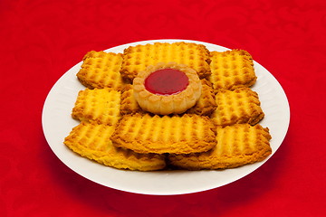 Image showing plate of cookies on red background