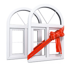 Image showing Plastic windows with red ribbon gift