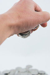 Image showing Holding coin