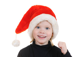 Image showing The child in a hat santa claus