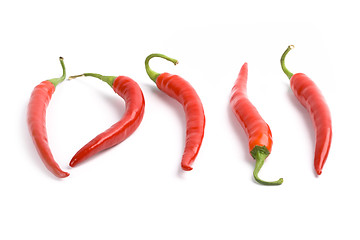 Image showing five red chilly peppers