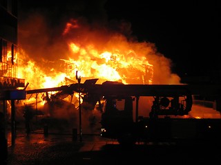 Image showing Firetruck infront of burning house