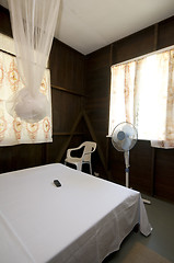 Image showing budget guest house room with mosquito net