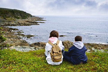 Image showing Children sitting at Atlantic coast in Newfoundland