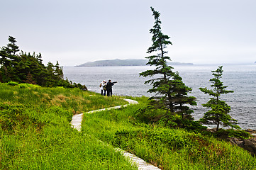 Image showing Father and children at Atlantic coast in Newfoundland