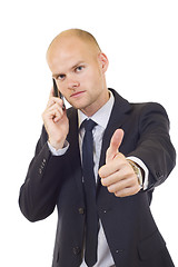 Image showing businessman on the phone and thumbs up