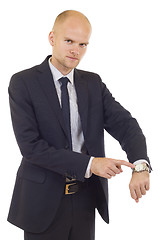 Image showing businessman checking time