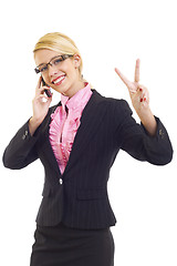 Image showing woman with phone and victory gesture