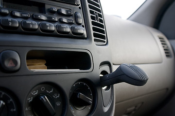 Image showing Dashboard, radio and the plug in ionizer