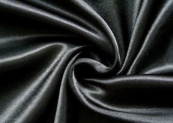 Image showing Smooth elegant black silk as background