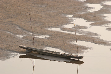 Image showing Two boats on the riverbed of Mekong