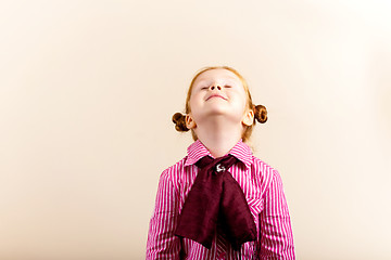 Image showing Portrait of cute elegant redhead girl looking up closed eyes