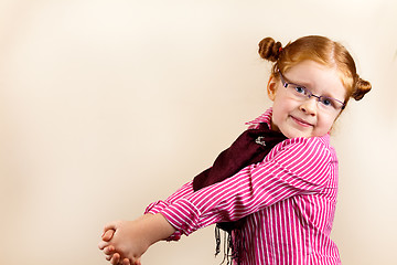 Image showing Portrait of cute elegant redhead girl begging for somthing 