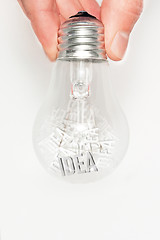 Image showing Hand with light bulb full of ideas