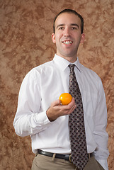 Image showing Employee With Orange